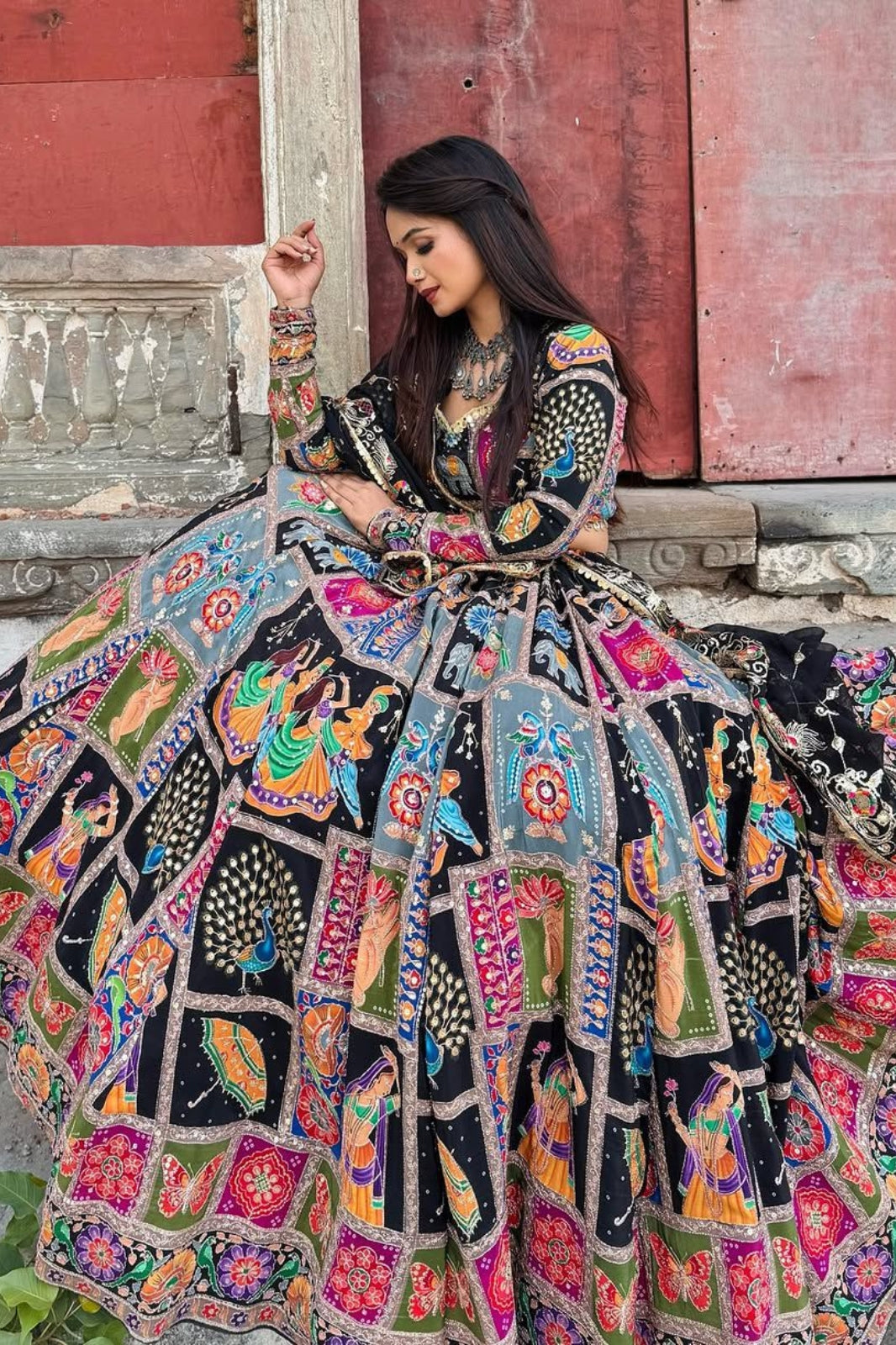 Elegant Navratri special with graceful flair, mirror work, and embroidered dupatta